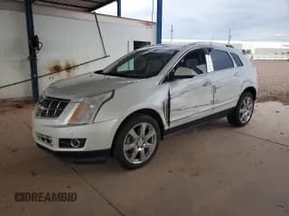 ✅ 2012 Cadillac SRX Premium Collection • VIN: 3GYFNCE38CS570688 • Lot: 70170855. Wystawiony na Copart z przebiegiem 153 317 mil. Bezpłatny archiwum sprzedaży aukcyjnych z USA i szczegółowy raport historii pojazdu na DreamBid. Zdjęcie 1.