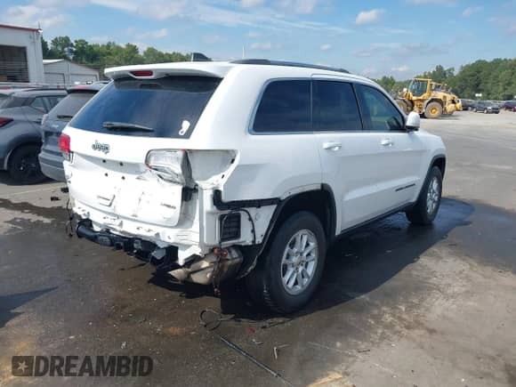 2018 Jeep Grand Cherokee Altitude z VIN 1C4RJFAGXJC504400, wystawiony jako IAAI lot #43318140 z przebiegiem 100 572 mil mil oraz . Historia ofert i sprzedaży dostępna na DreamBid. Obrazek 4.