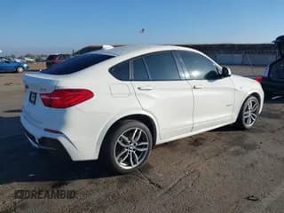 ✅ 2016 BMW X4 xDrive28i • VIN: 5UXXW3C58G0R22594 • Lot: 43550600. Wystawiony na IAAI z przebiegiem 96 471 mil. Bezpłatny archiwum sprzedaży aukcyjnych z USA i szczegółowy raport historii pojazdu na DreamBid. Zdjęcie 4.