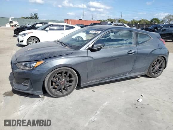 2019 Hyundai Veloster Turbo z VIN KMHTH6AB4KU007744, wystawiony jako Copart lot #88815645 z przebiegiem 88 738 mil mil oraz Nie do naprawy • Non repairable. Historia ofert i sprzedaży dostępna na DreamBid. Obrazek 1.