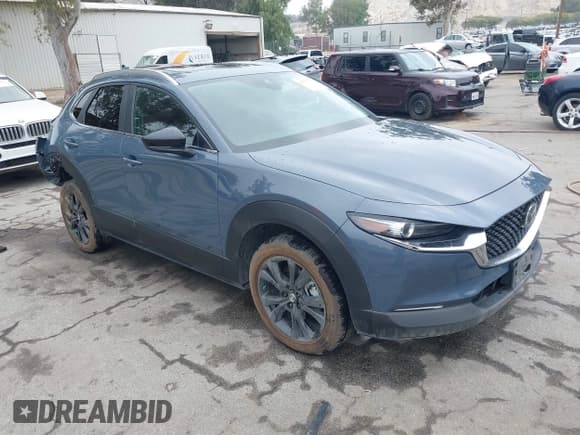 ✅ 2022 Mazda CX-30 S Carbon Edition • VIN: 3MVDMBCL0NM456154 • Lot: 42153202. Listed on IAAI with 40,372 mi. Free auction sales archive from the USA and detailed vehicle history report at DreamBid. Image 1.