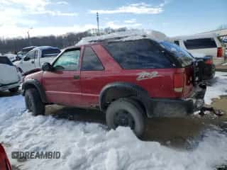 2002 Chevrolet Blazer LS with VIN 1GNCT18W12K108077, listed as a Copart auction lot 87490474 with 130,244 mi miles and Salvage title. Bid and sale history available at DreamBid. Image 2.