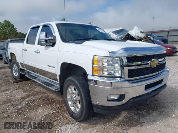 2013 Chevrolet Silverado 2500HD LTZ with VIN 1GC1KYCG7DF151006, listed as a IAAI auction lot 43263484 with 129,989 mi miles and . Bid and sale history available at DreamBid. Image 1.