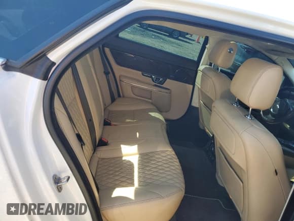 ✅ 2017 Jaguar XJ Portfolio • VIN: SAJWA2G78H8W03878 • Lot: 48054195. Listed on Copart with 93,510 mi. Free auction sales archive from the USA and detailed vehicle history report at DreamBid. Image 11.