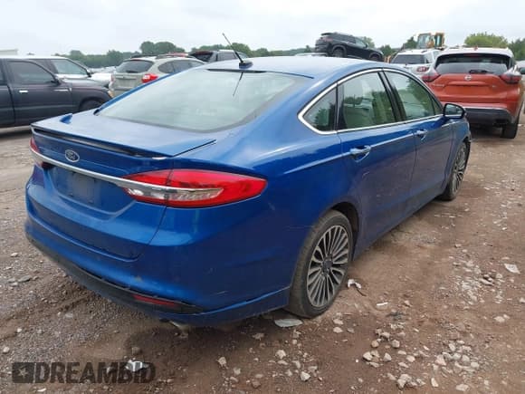 ✅ 2017 Ford Fusion Hybrid Titanium • VIN: 3FA6P0RU4HR388525 • Lot: 43136734. Wystawiony na IAAI z przebiegiem 206 994 mil. Bezpłatny archiwum sprzedaży aukcyjnych z USA i szczegółowy raport historii pojazdu na DreamBid. Zdjęcie 4.