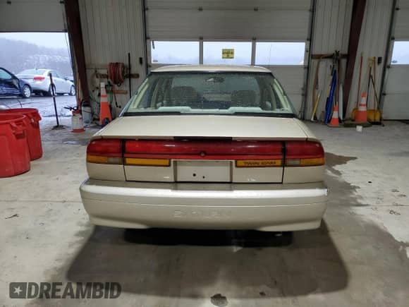 1995 Saturn SL с VIN 1G8ZK5271SZ238117, выставлен на аукционе Copart как лот 83723624 с пробегом 80 535 миль миль и Чистый • Clean title. История ставок и продаж доступна на DreamBid. Изображение 6.