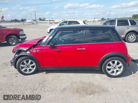 ✅ 2006 MINI Hardtop • VIN: WMWRC33526TK18176 • Lot: 41643771. Listed on IAAI with 115,778 mi. Free auction sales archive from the USA and detailed vehicle history report at DreamBid. Image 14.