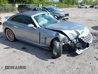 ✅ 2005 Chrysler Crossfire SRT-6 • VIN: 1C3AN79N65X040681 • Lot: 43715112. Wystawiony na IAAI z przebiegiem 114 571 mil. Bezpłatny archiwum sprzedaży aukcyjnych z USA i szczegółowy raport historii pojazdu na DreamBid. Zdjęcie 1.