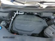 ✅ 2021 Honda Passport Touring • VIN: 5FNYF8H92MB042258 • Lot: 68150945. Listed on Copart with 60,684 mi. Free auction sales archive from the USA and detailed vehicle history report at DreamBid. Image 16.