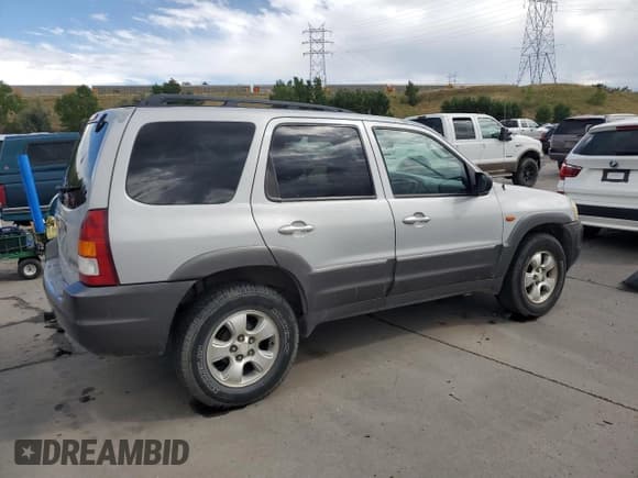 ✅ 2003 Mazda Tribute LX • VIN: 4F2CZ94193KM14204 • Lot: 66727244. Listed on Copart with 198,000 mi. Free auction sales archive from the USA and detailed vehicle history report at DreamBid. Image 3.