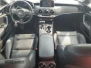 ✅ 2018 Kia Stinger • VIN: KNAE15LA4J6017450 • Лот: 64032395. Опубликован ранее на Copart с пробегом 83 577 миль. Бесплатный доступ к архиву аукционных продаж из США и подробный отчёт об истории автомобиля на DreamBid. Изображение 8.