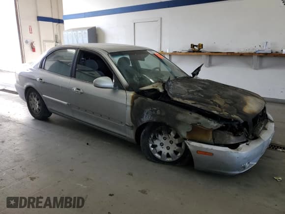 ✅ 2003 Kia Optima LX • VIN: KNAGD126335211255 • Лот: 60637665. Опубликован ранее на Copart с пробегом Не указан. Бесплатный доступ к архиву аукционных продаж из США и подробный отчёт об истории автомобиля на DreamBid. Изображение 4.