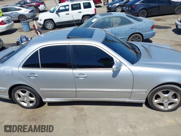 ✅ 2000 Mercedes-Benz E 320 • VIN: WDBJF70J7YB014156 • Lot: 42515689. Listed on IAAI with 77,543 mi. Free auction sales archive from the USA and detailed vehicle history report at DreamBid. Image 13.