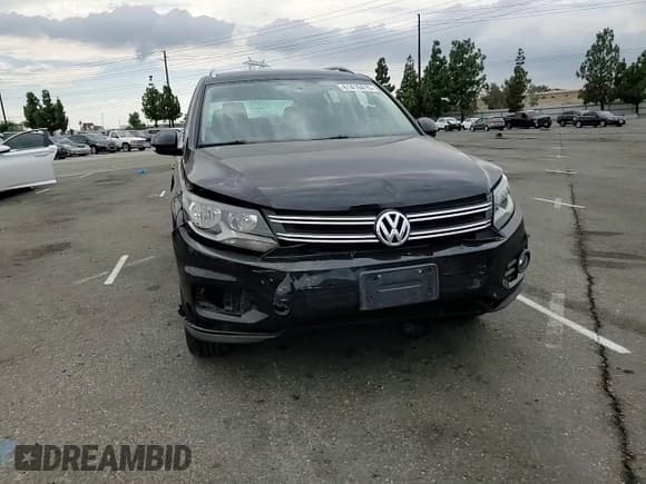 ✅ 2012 Volkswagen Tiguan S • VIN: WVGAV7AX9CW536596 • Лот: 81416415. Опубликован ранее на Copart с пробегом 70 495 миль. Бесплатный доступ к архиву аукционных продаж из США и подробный отчёт об истории автомобиля на DreamBid. Изображение 14.