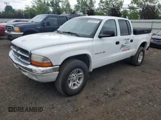 ✅ 2001 Dodge Dakota Sport • VIN: 1B7GG2AN01S142094 • Lot: 57018215. Wystawiony na Copart z przebiegiem 136 340 mil. Bezpłatny archiwum sprzedaży aukcyjnych z USA i szczegółowy raport historii pojazdu na DreamBid. Zdjęcie 1.