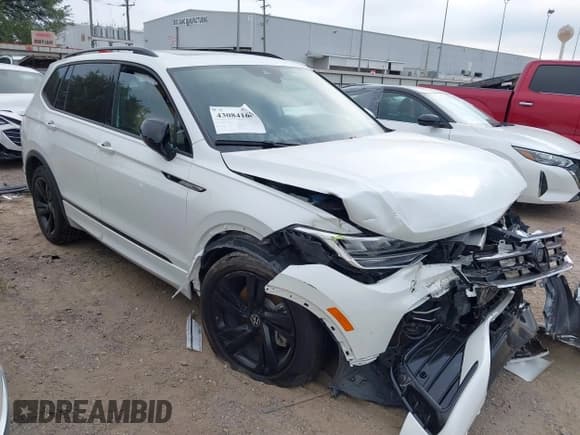 ✅ 2023 Volkswagen Tiguan SE R-Line Black • VIN: 3VVCB7AXXPM014458 • Lot: 43084168. Wystawiony na IAAI z przebiegiem 26 374 mil. Bezpłatny archiwum sprzedaży aukcyjnych z USA i szczegółowy raport historii pojazdu na DreamBid. Zdjęcie 1.