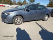 ✅ 2014 Toyota Corolla LE Eco • VIN: 2T1BPRHE2EC103300 • Lot: 91729025. Listed on Copart with 183,373 mi. Free auction sales archive from the USA and detailed vehicle history report at DreamBid. Image 1.