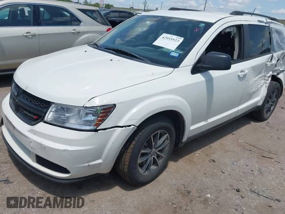 2018 Dodge Journey SE с VIN 3C4PDCAB2JT288452, выставлен на аукционе IAAI как лот 42955923 с пробегом 185 068 миль миль и . История ставок и продаж доступна на DreamBid. Изображение 17.