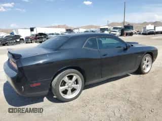 2014 Dodge Challenger R/T z VIN 2C3CDYBT2EH298517, wystawiony jako Copart lot #64642864 z przebiegiem 97 070 mil mil oraz Szkoda całkowita • Salvage title. Historia ofert i sprzedaży dostępna na DreamBid. Obrazek 3.