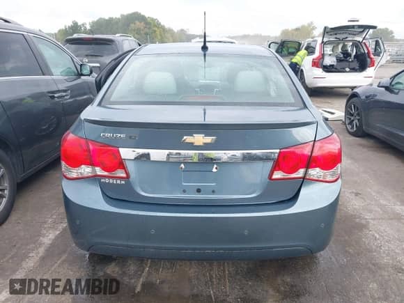 2012 Chevrolet Cruze ECO z VIN 1G1PJ5SCXC7308927, wystawiony jako IAAI lot #43399447 z przebiegiem 144 164 mil mil oraz . Historia ofert i sprzedaży dostępna na DreamBid. Obrazek 16.