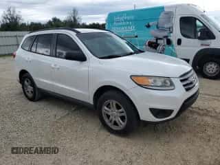 2012 Hyundai Santa Fe GLS z VIN 5XYZG3ABXCG113666, wystawiony jako Copart lot #74131604 z przebiegiem 121 303 mil mil oraz Szkoda całkowita • Salvage title. Historia ofert i sprzedaży dostępna na DreamBid. Obrazek 4.