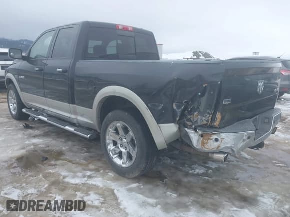 ✅ 2009 Dodge 1500 SLT • VIN: 1D3HV18TX9S763872 • Lot: 41609783. Wystawiony na IAAI z przebiegiem 154 902 mil. Bezpłatny archiwum sprzedaży aukcyjnych z USA i szczegółowy raport historii pojazdu na DreamBid. Zdjęcie 3.
