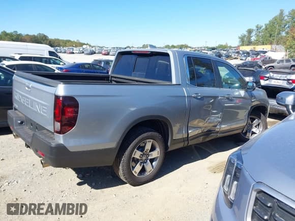✅ 2025 Honda Ridgeline RTL • VIN: 5FPYK3F53SB040201 • Lot: 43486647. Listed on IAAI with 9,583 mi. Free auction sales archive from the USA and detailed vehicle history report at DreamBid. Image 13.
