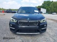 ✅ 2016 BMW X1 xDrive28i • VIN: WBXHT3C32G5E50186 • Lot: 43220255. Listed on IAAI with 72,024 mi. Free auction sales archive from the USA and detailed vehicle history report at DreamBid. Image 12.