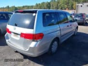 ✅ 2010 Honda Odyssey LX • VIN: 5FNRL3H23AB015696 • Lot: 43404697. Listed on IAAI with 195,124 mi. Free auction sales archive from the USA and detailed vehicle history report at DreamBid. Image 4.