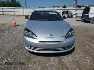 2008 Hyundai Tiburon GS с VIN KMHHM66D88U292212, выставлен на аукционе Copart как лот 61728975 с пробегом 129 358 миль миль и Чистый • Clean title. История ставок и продаж доступна на DreamBid. Изображение 5.
