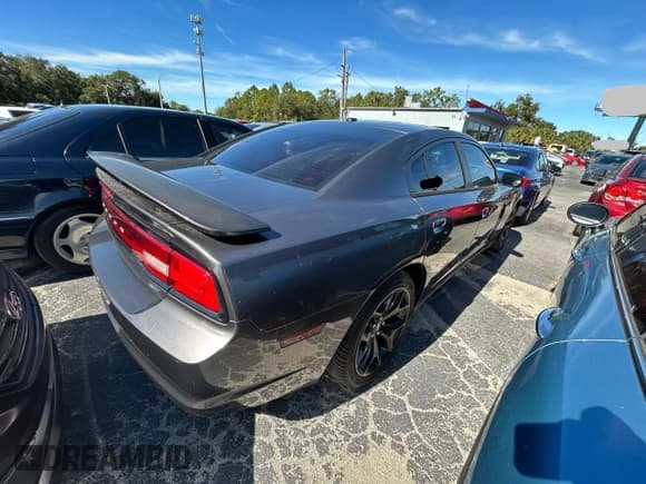 ✅ 2014 Dodge Charger SXT • VIN: 2C3CDXHG4EH161082 • Lot: 92727135. Listed on Copart with 173,920 mi. Free auction sales archive from the USA and detailed vehicle history report at DreamBid. Image 4.