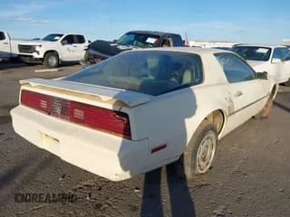 ✅ 1984 Pontiac Firebird • VIN: 1G2AS8719EL262458 • Lot: 43611020. Listed on IAAI with 104,068 mi. Free auction sales archive from the USA and detailed vehicle history report at DreamBid. Image 4.