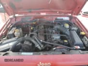 ✅ 2001 Jeep Cherokee Sport • VIN: 1J4FF58S51L573496 • Lot: 68876345. Listed on Copart with 168,843 mi. Free auction sales archive from the USA and detailed vehicle history report at DreamBid. Image 11.