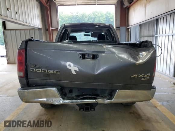 2003 Dodge 1500 ST z VIN 1D7HU18D53J643744, wystawiony jako Copart lot #62957654 z przebiegiem 240 625 mil mil oraz Szkoda całkowita • Salvage title. Historia ofert i sprzedaży dostępna na DreamBid. Obrazek 6.