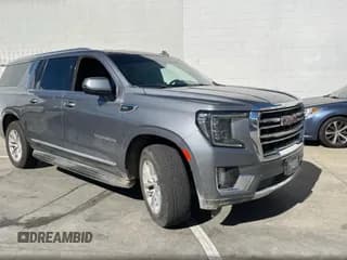 ✅ 2021 GMC Yukon XL SLT • VIN: 1GKS2GKD7MR142198 • Lot: 91519195. Listed on Copart with 164,414 mi. Free auction sales archive from the USA and detailed vehicle history report at DreamBid. Image 1.