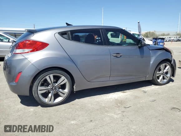 ✅ 2013 Hyundai Veloster w/Gray Int • VIN: KMHTC6AD6DU157891 • Lot: 68024834. Listed on Copart with 112,561 mi. Free auction sales archive from the USA and detailed vehicle history report at DreamBid. Image 3.