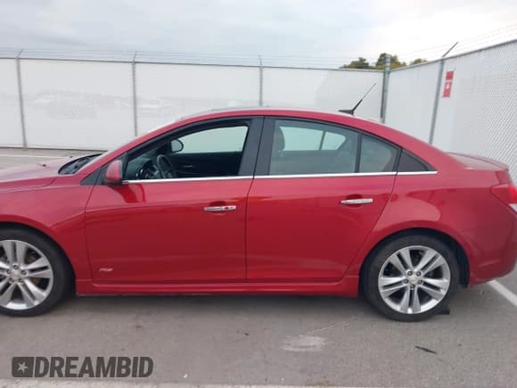 ✅ 2012 Chevrolet Cruze LTZ • VIN: 1G1PH5SC7C7316771 • Лот: 43451642. Опубликован ранее на IAAI с пробегом 133 334 миль. Бесплатный доступ к архиву аукционных продаж из США и подробный отчёт об истории автомобиля на DreamBid. Изображение 14.