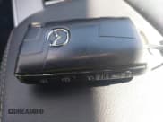 ✅ 2024 Mazda CX-90 Premium • VIN: JM3KKDHD9R1145876 • Lot: 43189061. Listed on IAAI with 24,723 mi. Free auction sales archive from the USA and detailed vehicle history report at DreamBid. Image 11.