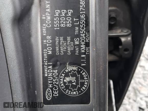 2005 Hyundai Accent GLS z VIN KMHCG45C55U617585, wystawiony jako Copart lot #47449285 z przebiegiem 141 635 mil mil oraz Szkoda całkowita • Salvage title. Historia ofert i sprzedaży dostępna na DreamBid. Obrazek 13.