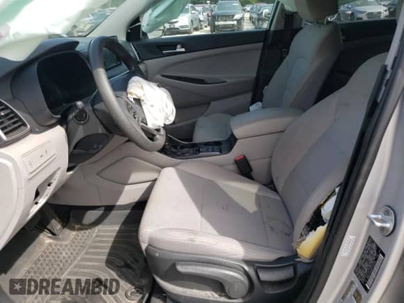 2019 Hyundai Tucson SE z VIN KM8J23A48KU928096, wystawiony jako Copart lot #71921215 z przebiegiem 54 422 mil mil oraz Szkoda całkowita • Salvage title. Historia ofert i sprzedaży dostępna na DreamBid. Obrazek 7.