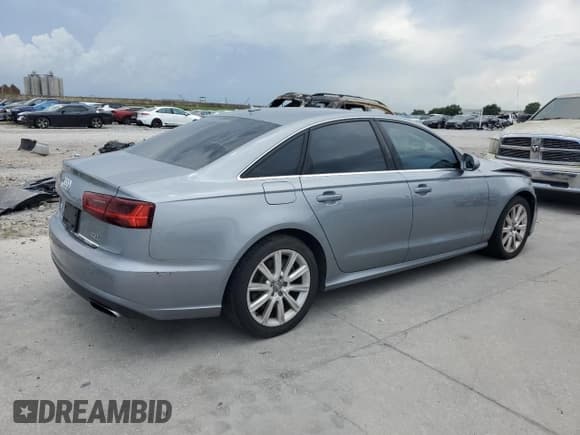 ✅ 2016 Audi A6 Premium • VIN: WAUFFAFC3GN013092 • Lot: 63565685. Listed on Copart with 82,983 mi. Free auction sales archive from the USA and detailed vehicle history report at DreamBid. Image 3.