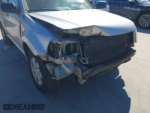 ✅ 2010 Mercury Mariner • VIN: 4M2CN8B72AKJ26206 • Лот: 43559517. Опубликован ранее на IAAI с пробегом 150 394 миль. Бесплатный доступ к архиву аукционных продаж из США и подробный отчёт об истории автомобиля на DreamBid. Изображение 6.