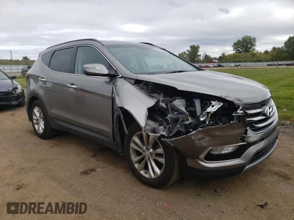 ✅ 2018 Hyundai Santa Fe Limited • VIN: 5XYZUDLA4JG549784 • Лот: 70005283. Опубликован ранее на Copart с пробегом 47 686 миль. Бесплатный доступ к архиву аукционных продаж из США и подробный отчёт об истории автомобиля на DreamBid. Изображение 4.