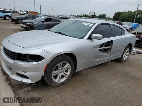 2022 Dodge Charger SXT with VIN 2C3CDXBG0NH197084, listed as a Copart auction lot 71043965 with 89,187 mi miles and Salvage title. Bid and sale history available at DreamBid. Image 1.