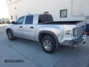 ✅ 2006 Mitsubishi Raider Duro Cross • VIN: 1Z7HT38N46S543185 • Lot: 85908305. Listed on Copart with 159,593 mi. Free auction sales archive from the USA and detailed vehicle history report at DreamBid. Image 2.