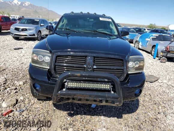 2005 Dodge Dakota ST with VIN 1D7HW28K55S259104, listed as a Copart auction lot 55859185 with 143,004 mi miles and Salvage title. Bid and sale history available at DreamBid. Image 5.