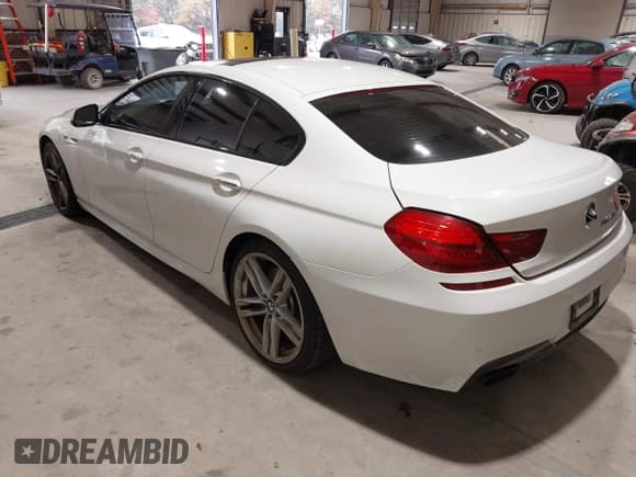 ✅ 2014 BMW 6 Series 650i • VIN: WBA6B2C58ED129009 • Lot: 43546135. Listed on IAAI with 123,509 mi. Free auction sales archive from the USA and detailed vehicle history report at DreamBid. Image 3.