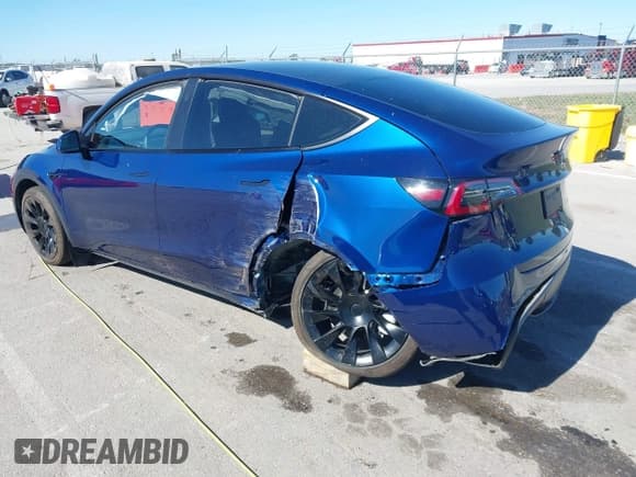 ✅ 2023 Tesla Model Y Long Range • VIN: 7SAYGDEE6PA162351 • Lot: 43515048. Listed on IAAI with 24,605 mi. Free auction sales archive from the USA and detailed vehicle history report at DreamBid. Image 3.