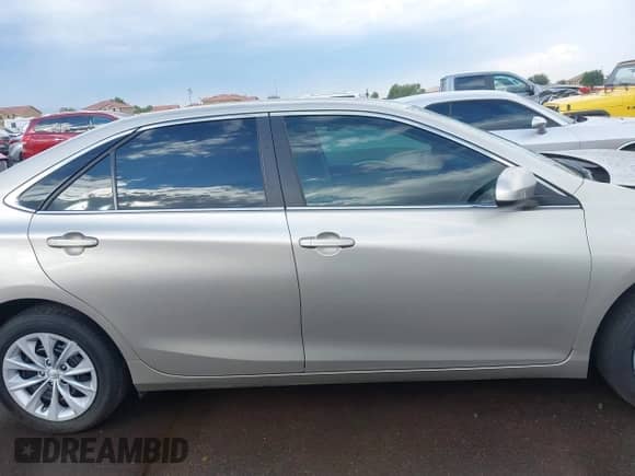 2016 Toyota Camry LE with VIN 4T4BF1FK1GR560412, listed as a IAAI auction lot 43517428 with 26,850 mi miles and . Bid and sale history available at DreamBid. Image 13.