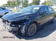 ✅ 2018 Ford Fusion Titanium • VIN: 3FA6P0RUXJR120794 • Lot: 43329083. Listed on IAAI with 126,041 mi. Free auction sales archive from the USA and detailed vehicle history report at DreamBid. Image 17.